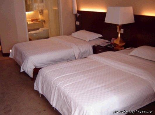 Bluesky Hotel Гуанджоу Стая снимка